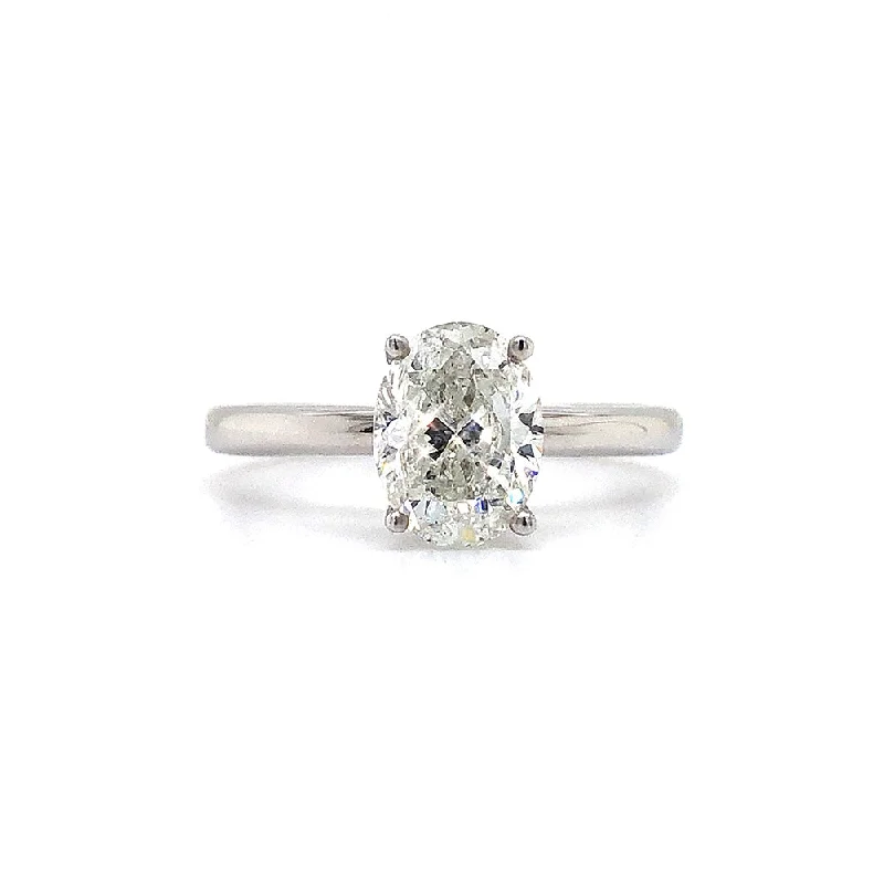 Oval Diamond Solitaire Ring with Hidden Halo Detailing