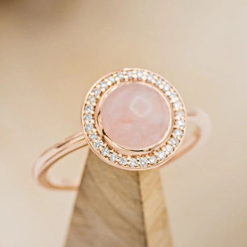 "TERRA" - ROUND CABOCHON CUT ROSE QUARTZ ENGAGEMENT RING WITH DIAMOND HALO